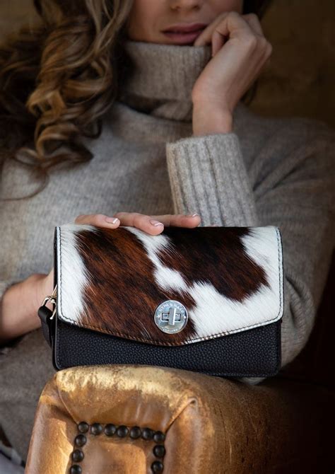 fake cowhide bag|hyde and hare cowhide bags.